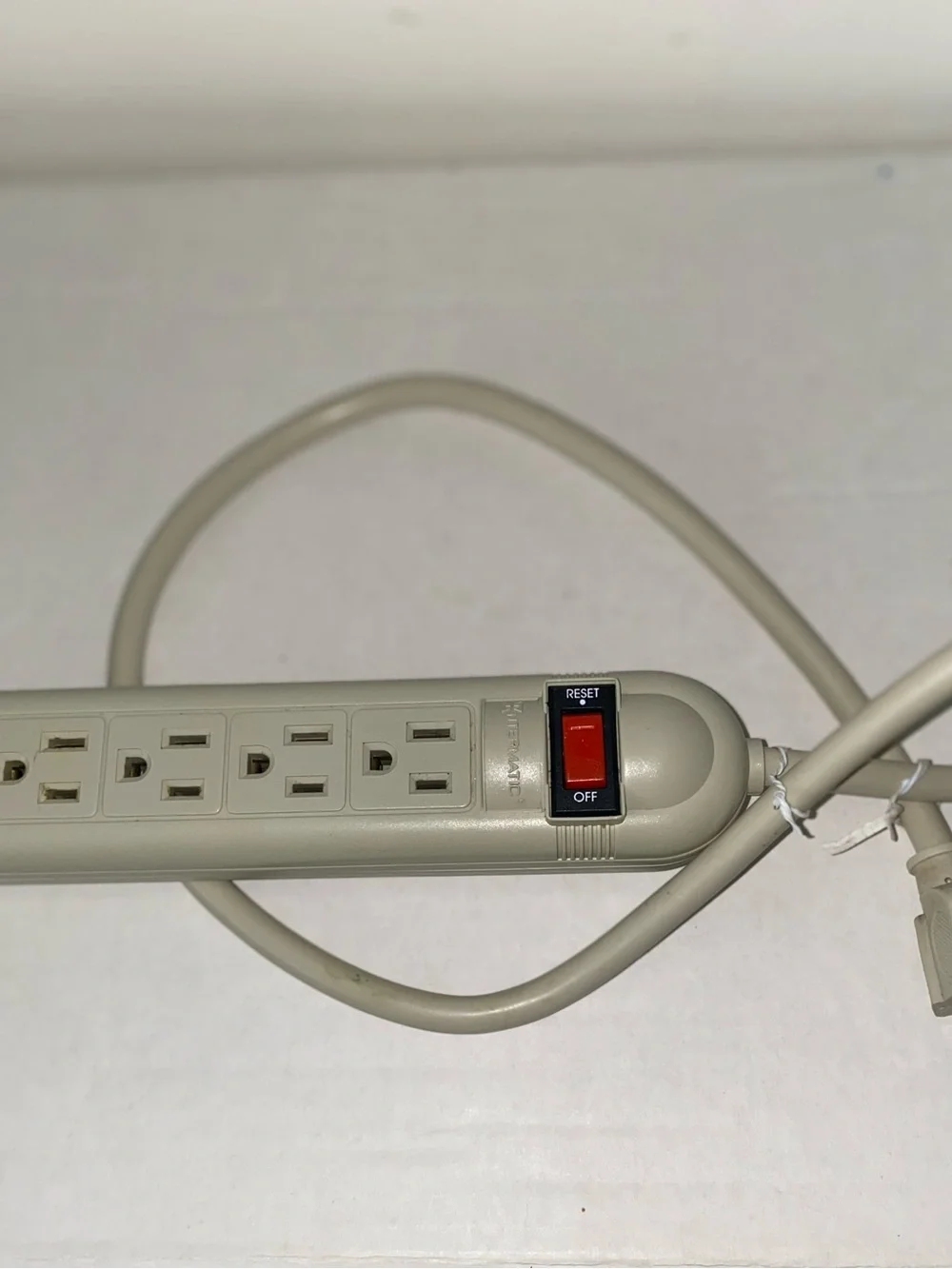 2 Electrical Outlet/Surge Protector Power Strips with Reset Switch.Black & Beige